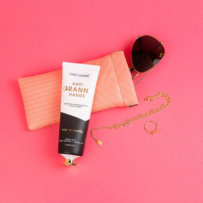 Chez Gagné Anti-Granny Hands Orange Vanilla hand crème styled with accessories
