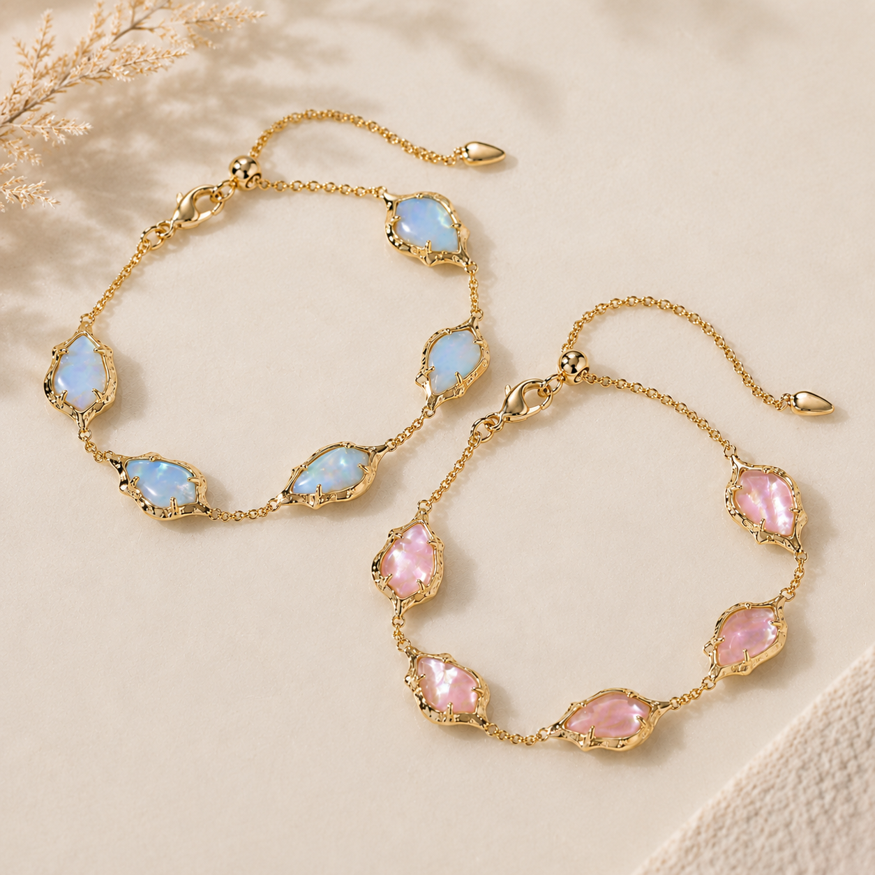 Kendra Scott Adriana Scallop Frame Delicate Chain Bracelet in sky blue and light pink iridescent abalone variants