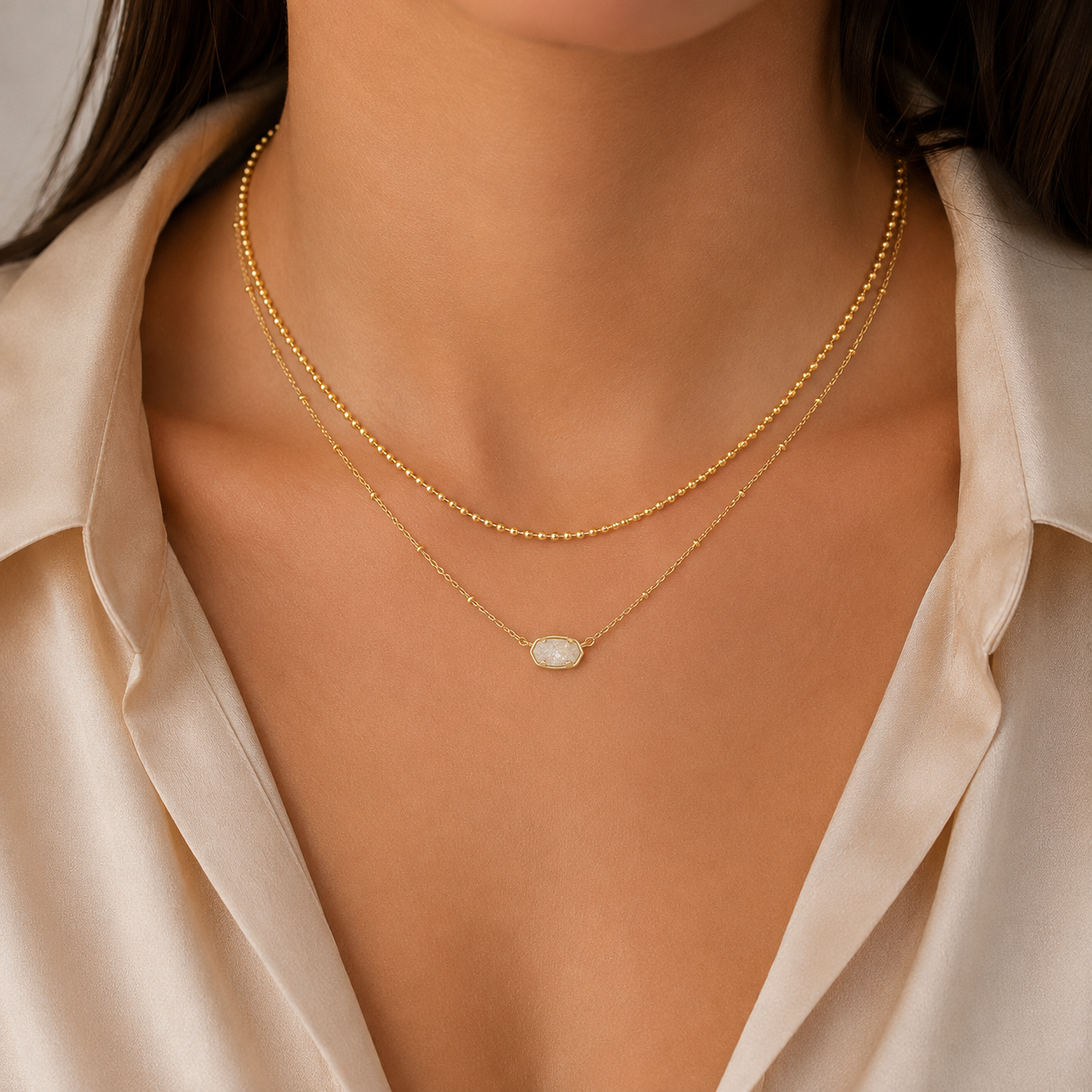 Kendra Scott Emilie Gold Iridescent Drusy Multi Strand Necklace worn on model with layered chain and delicate oval pendant detail