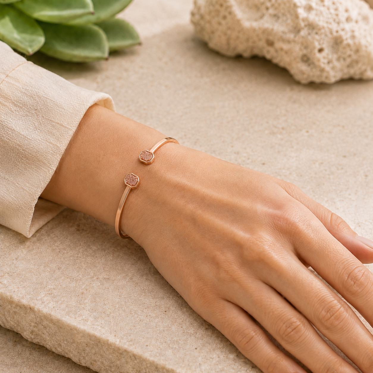 Kendra Scott Emilie rose gold Sand Drusy cuff bracelet worn on wrist