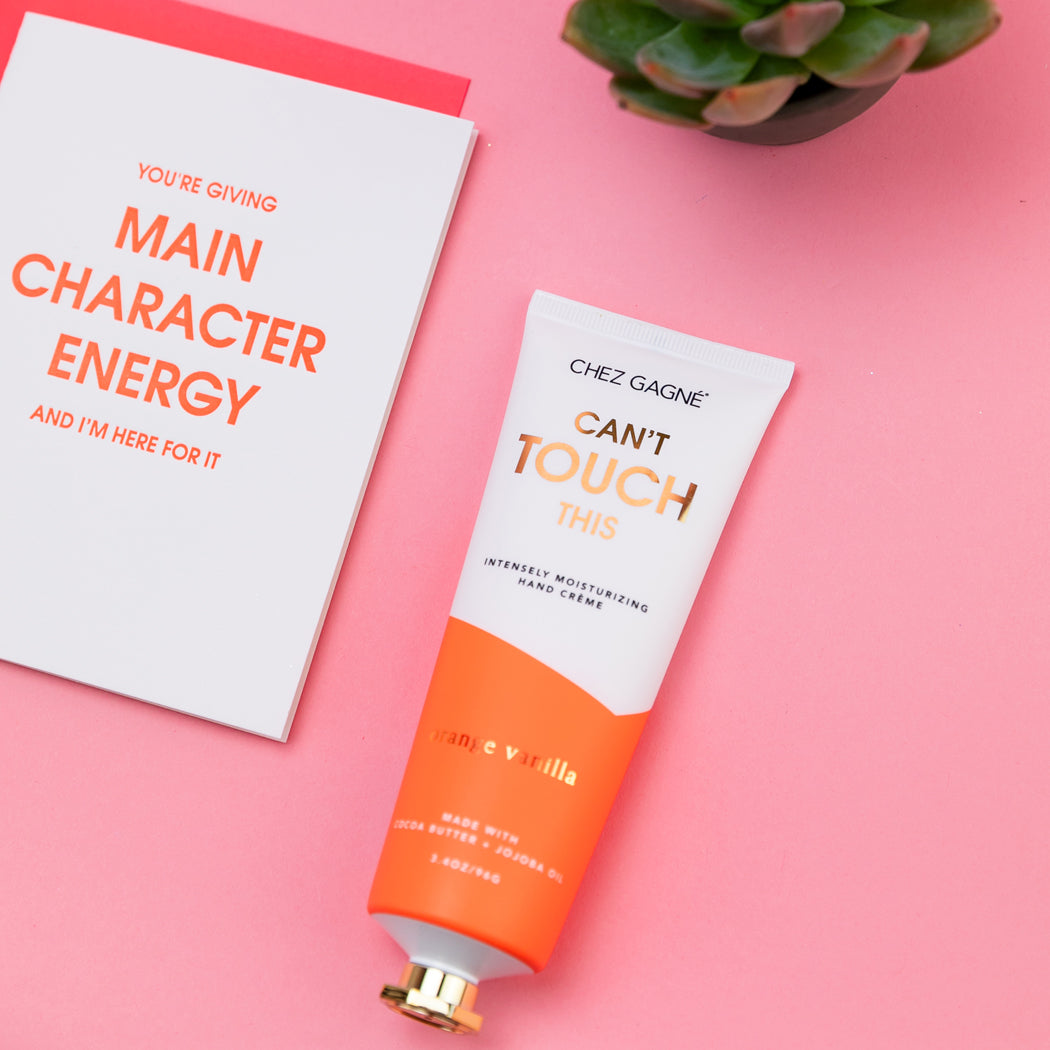 Chez Gagné Can't Touch This Orange Vanilla hand crème lifestyle flat lay
