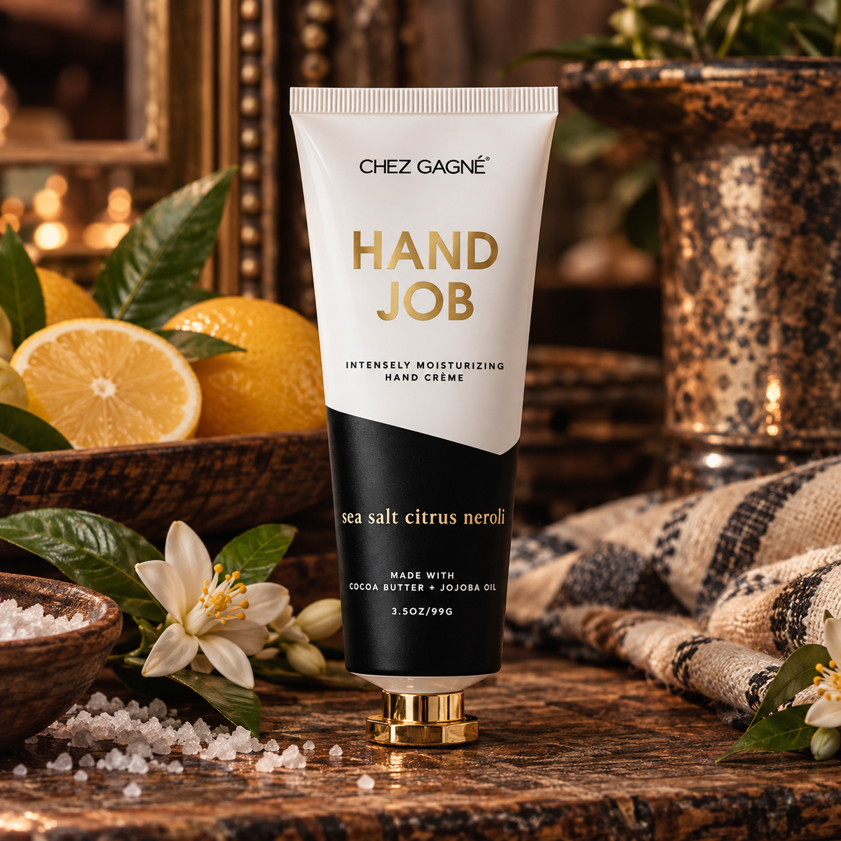 Chez Gagné Hand Job Sea Salt Citrus + Neroli hand crème in a warm Madame Peacock's styled setting