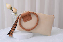 Load image into Gallery viewer, Cuff Handle Tassel Wristlet Clutch
