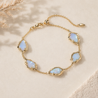 Kendra Scott Adriana Scallop Frame Delicate Chain Bracelet in Gold Sky Blue Iridescent Abalone