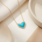 Kendra Scott Ari Heart Gold Short Pendant Necklace in Turquoise Magnesite with heart pendant