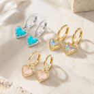 Kendra Scott Ari Heart Huggie Earrings in Gold Dichroic Glass, Gold Rose Quartz, and Silver Turquoise Magnesite