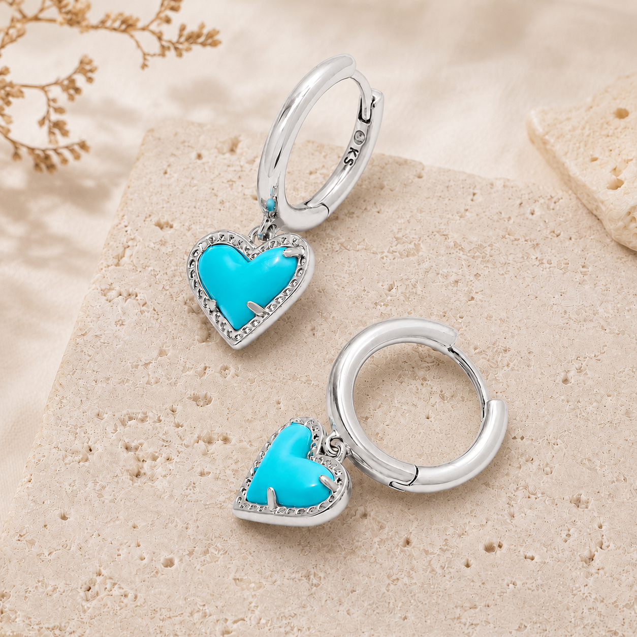 Kendra Scott Ari Heart Silver Huggie Earrings in genuine Turquoise Magnesite with blue heart charms and hinge closure