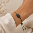 Kendra Scott Elaina Black Drusy bracelet worn on wrist with gunmetal chain and adjustable closure