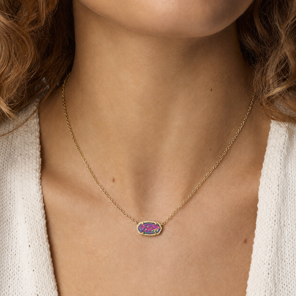 Kendra Scott Elisa Gold Dark Lavender Kyocera Opal Pendant Necklace worn on model with a vivid multicolor oval pendant