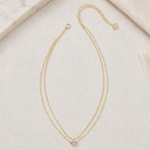 Kendra Scott Emilie Multi Strand Necklace in Gold Purple Amethyst with layered chains, Lobster clasp closure and faceted purple oval pendant