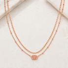 Kendra Scott Emilie Multi Strand Necklace in Rose Gold Sand Drusy with layered chains and sparkling oval pendant