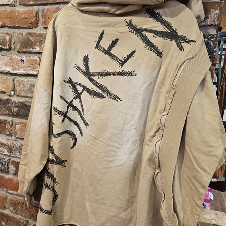 Trust Your Wings oversized tan hooded sweater back view